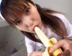 Ann Nanba Lovely Asian babe licks a banana