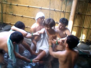 Japanese milf gets molested in the pool